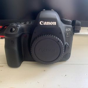 Canon EOS 6D mark ii, comes with lens, battery charger, and fader